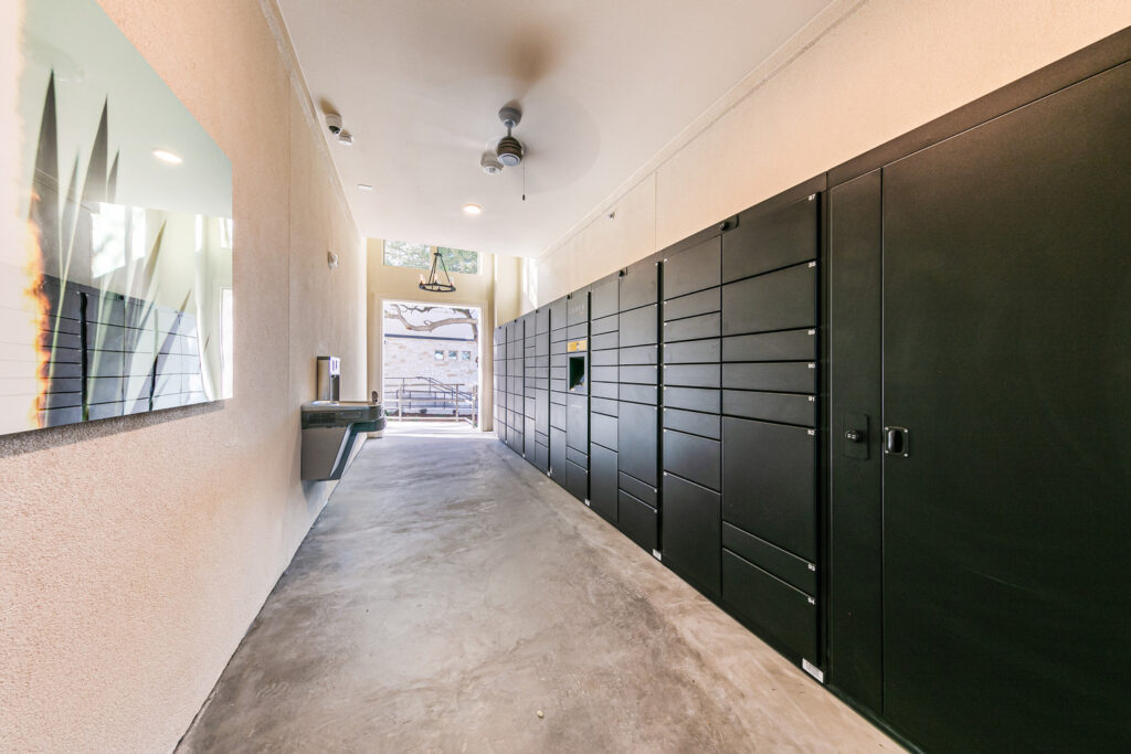 Community package locker room with water fountains